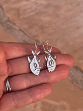 Permit earrings