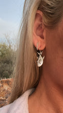 Permit earrings